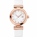 Refined dress watch with rose gold tone case and white strap on white background
