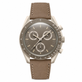 Taupe chronograph watch with taupe leather strap and light beige case on white background