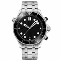 Diver style watch with black dial, black bezel, and silver metal bracelet