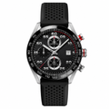 Sport chronograph watch with black dial, metal case, and black perforated rubber strap on white background