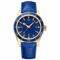 41mm gold-tone case watch with blue dial and leather strap on white background