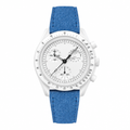 Sport chronograph watch with white dial, white case, and blue suede strap on white background