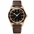Classic casual watch with black dial, gold-tone case, and brown leather strap