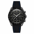 Sport chronograph watch with black dial and black rubber strap featuring blue stitching