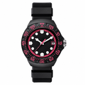 Black sport watch with rubber strap and pink accents on bezel and dial, on white background