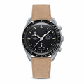 Black dial chronograph watch with beige suede strap on white background
