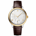 Dress watch with silver dial, gold bezel, and brown leather strap on white background