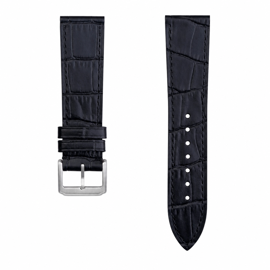 Black embossed leather watch strap with stainless steel buckle on white background