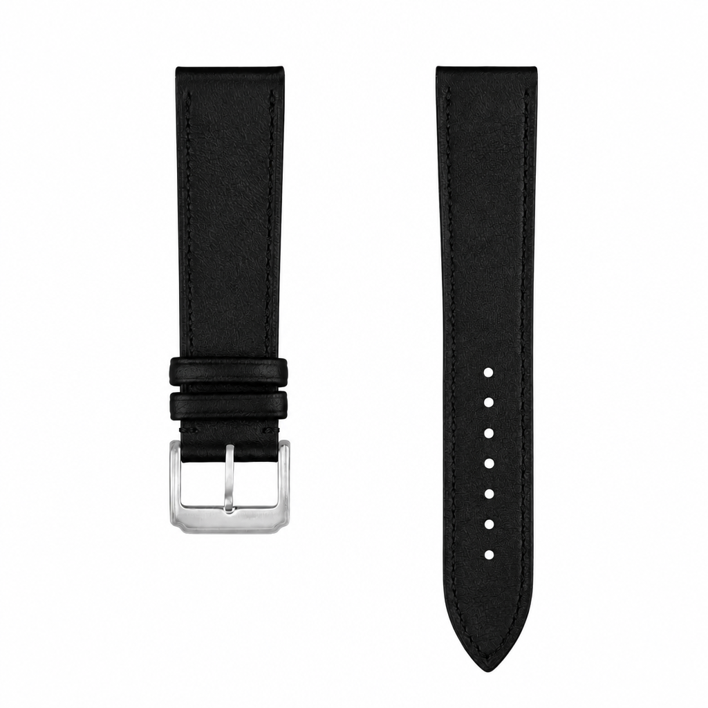 Black leather watch strap with silver buckle on white background
