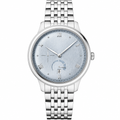 Classic dress watch with silver-tone metal case and bracelet, light silver-blue dial, Roman numerals, and date window