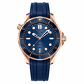 42mm diver watch with blue dial, rose gold-tone case, and blue rubber strap