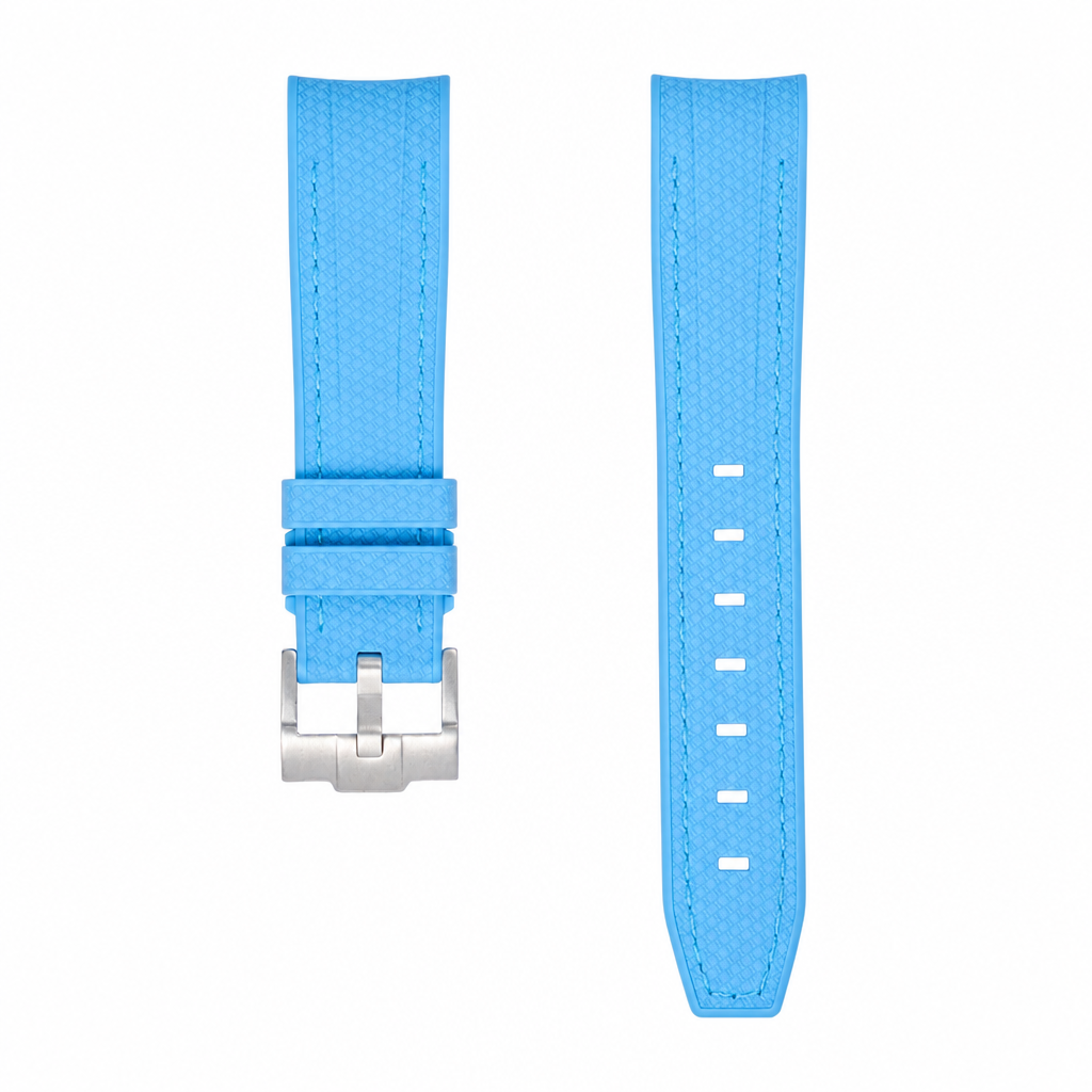 Blue rubber watch strap with silver buckle on white background