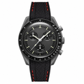 Chronograph watch with black dial and black rubber strap with red stitching detail