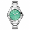 Stainless steel watch with turquoise dial and metal bracelet on white background