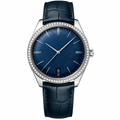 Dress watch with blue dial, silver case, and blue leather strap