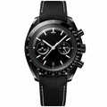 Black chronograph watch with black fabric strap and white stitching on a white background